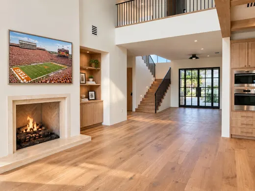Living room fireplace and stair (concept rendering)