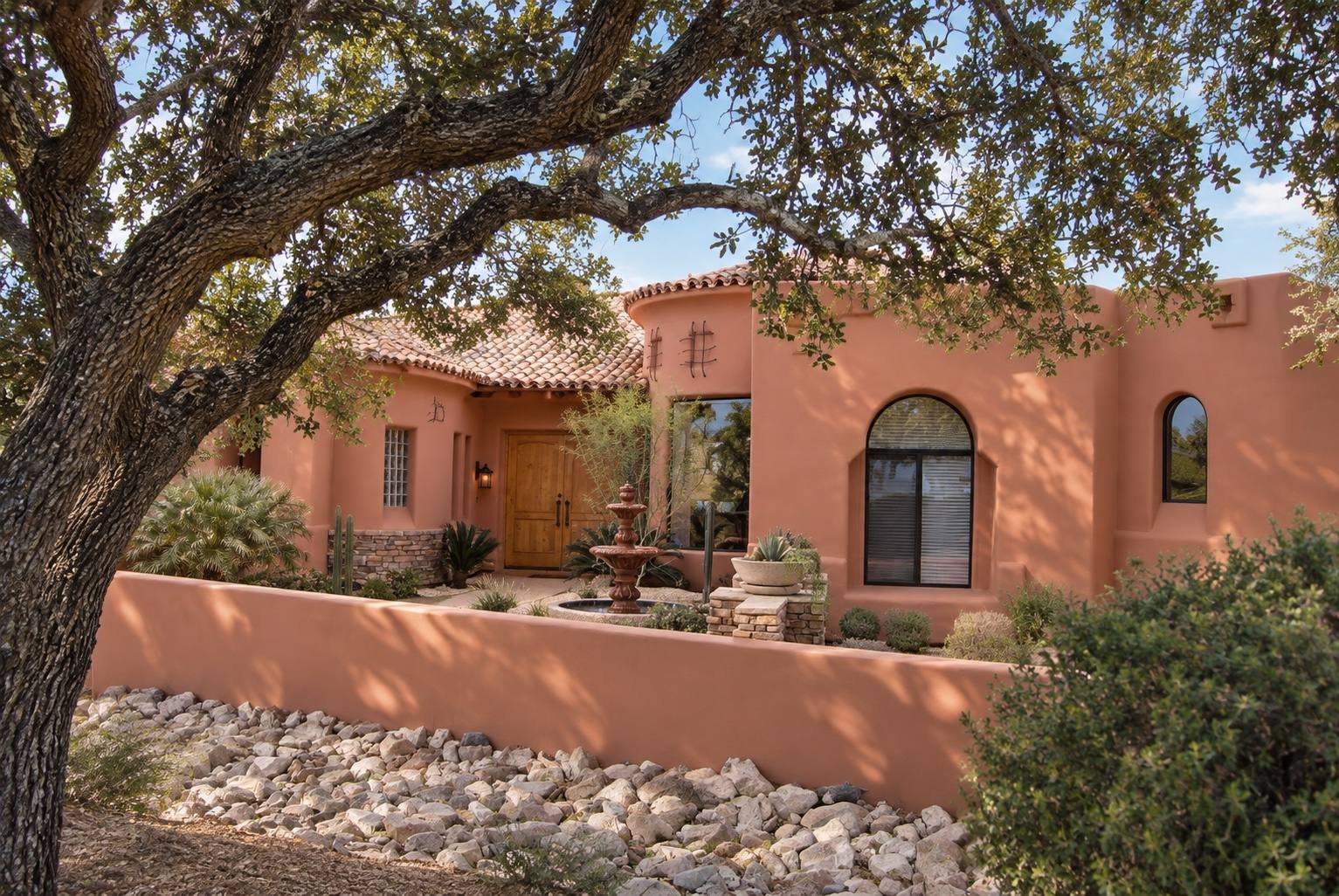 Southwest-style stucco home with courtyard wall (concept rendering)